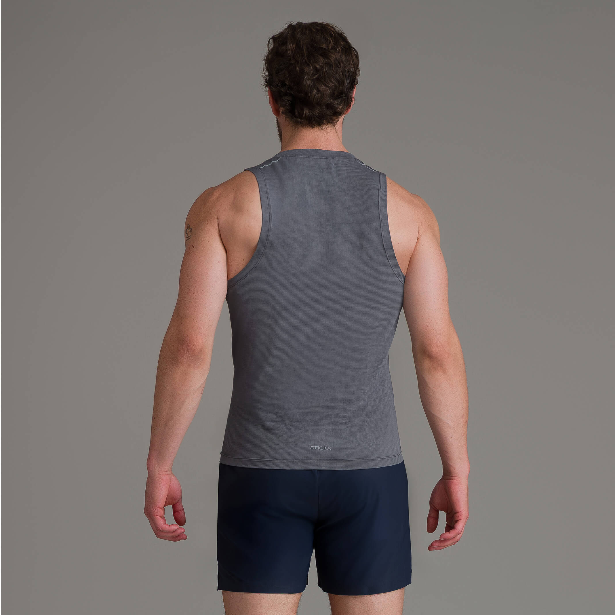 playera-sin-mangas-tank-deportivo-hombre-performance-atlekx.