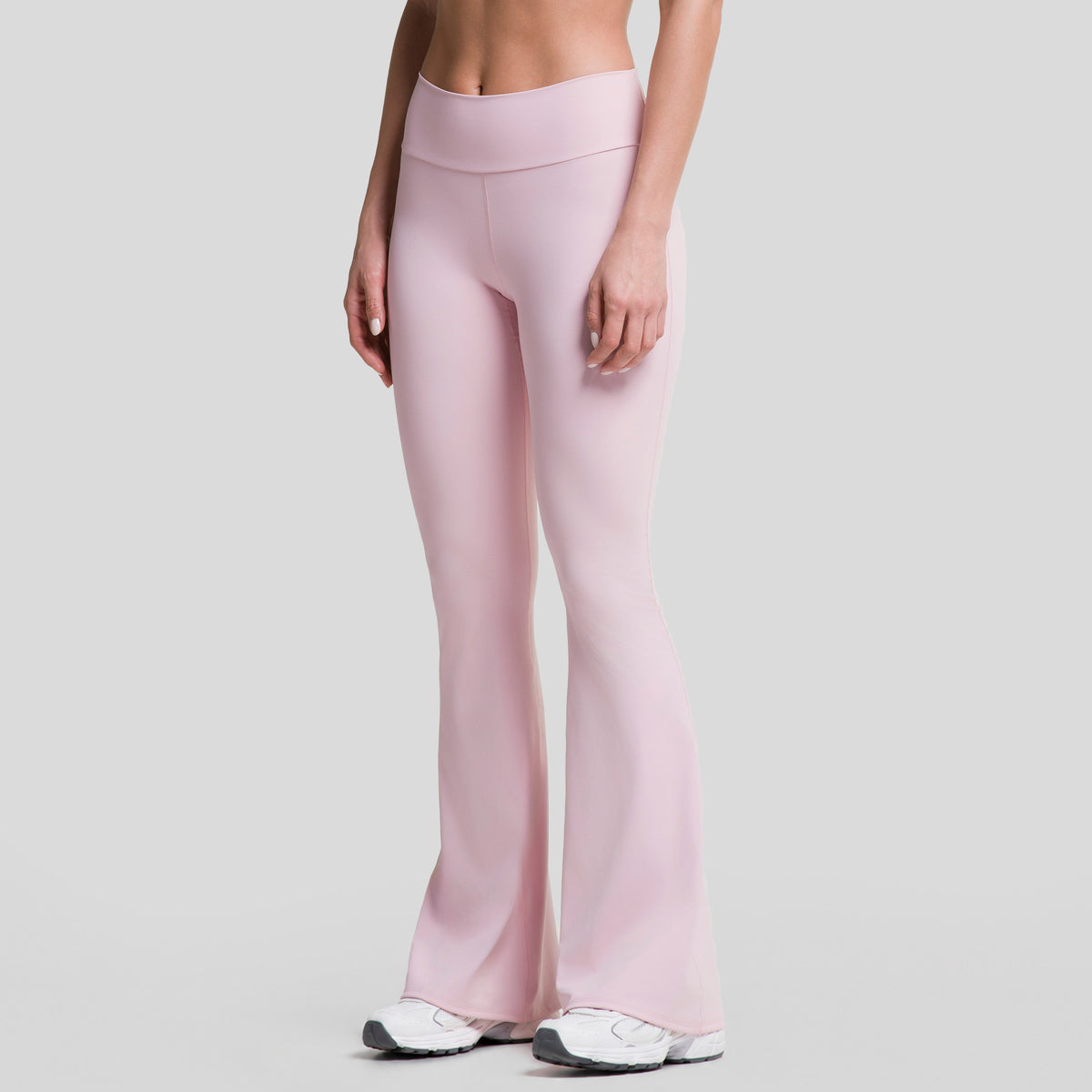 Leggings deportivos acampanados mujer rosa claro, vista lateral de la campana