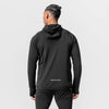 Technical hoodie de color negro, vista trasera.