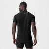 T-shirt para deportes high performance de color negro, vista trasera.