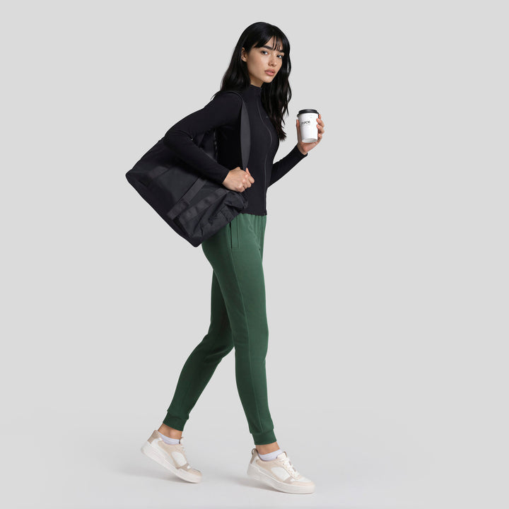 Chamarra deportiva con cremallera para mujer negra, manga larga y cuello alto