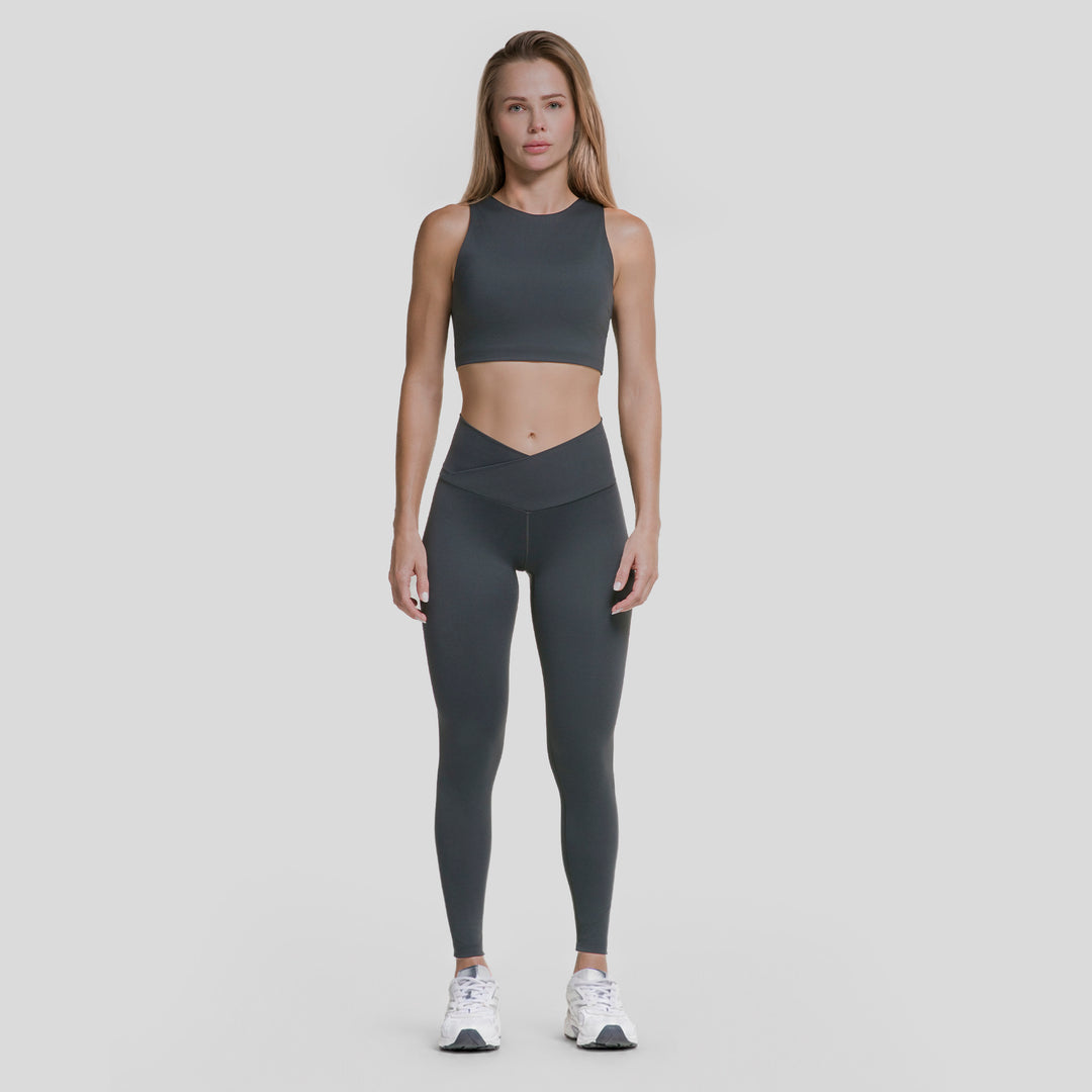 Leggings deportivos de mujer gris oscuro con pretina V y ajuste entallado