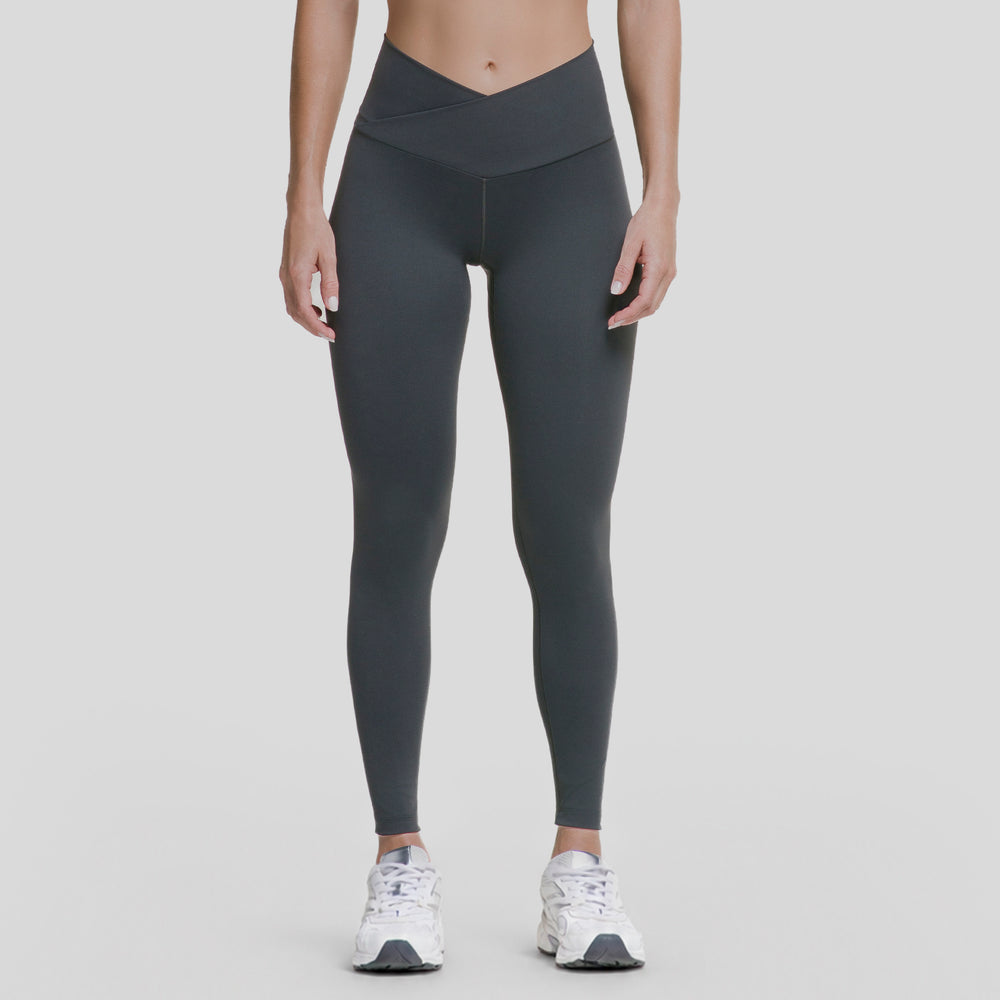 Leggings deportivos de mujer negros con pretina V y cintura alta