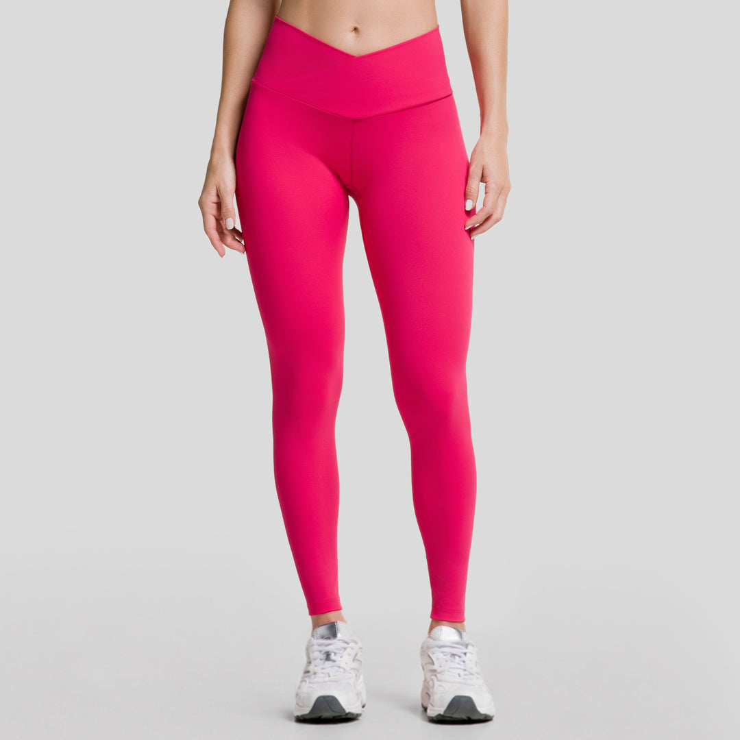 Leggings deportivos magenta de mujer con pretina V y cintura alta