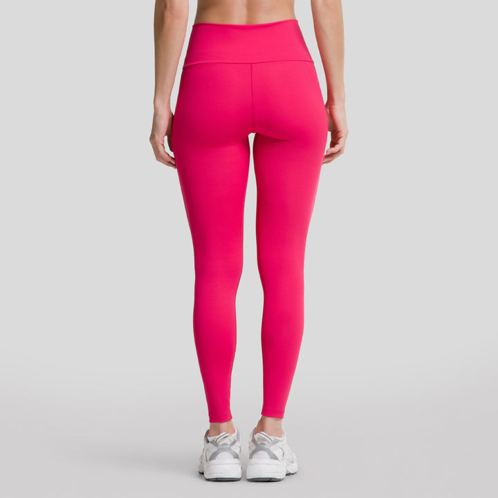 Leggings deportivos magenta de mujer con pretina V y largo hasta el tobillo