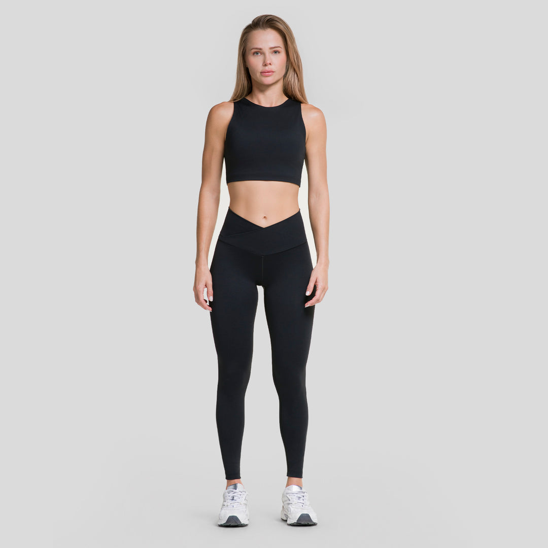 Leggings deportivos de mujer gris oscuro con pretina V y ajuste entallado