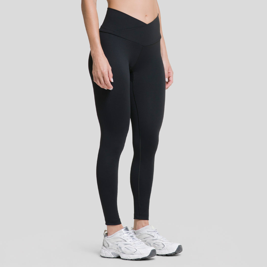 Legging deportivo negro mujer ATLEKX con pretina V-cut y costuras laterales