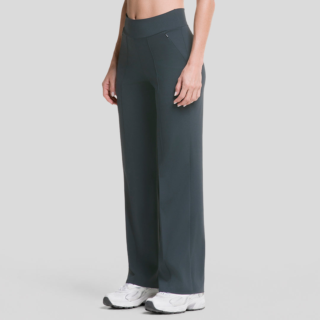 Pantalón deportivo mujer pierna ancha verde oscuro, vista lateral, cintura elástica