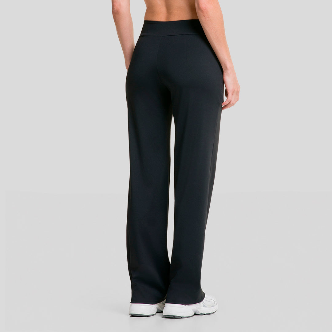 Pantalón deportivo mujer pierna ancha negro, vista frontal, cintura elástica y corte amplio
