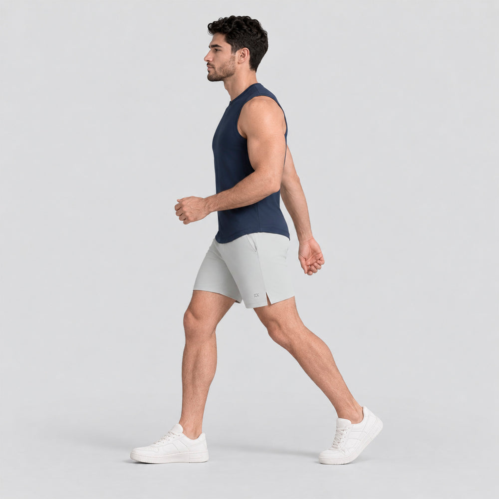 Conjunto deportivo de hombre: playera sin mangas azul marino y short gris claro