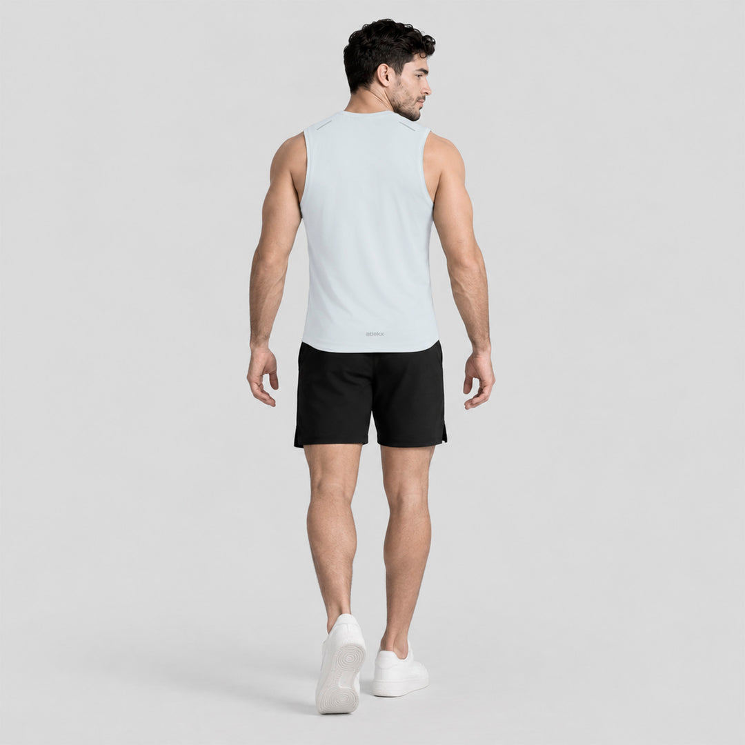 Conjunto deportivo: playera sin mangas blanca y short negro, vista trasera