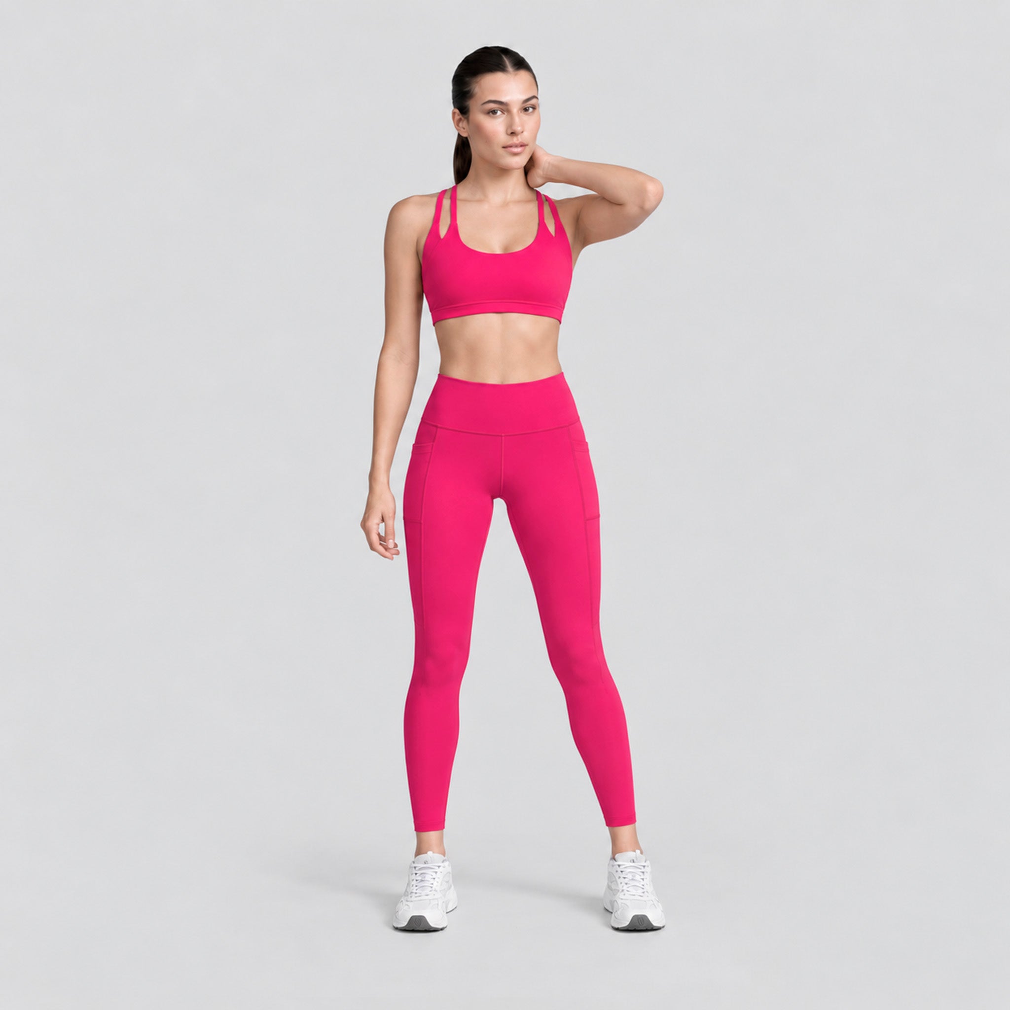 Conjunto deportivo de tirantes dobles y legging tiro alto en color fucsia