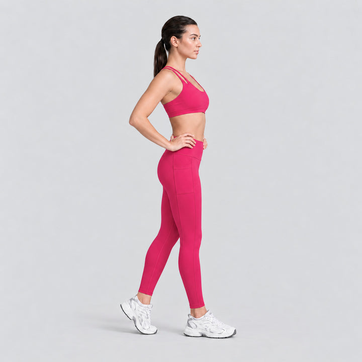 Conjunto deportivo fucsia: top de tirantes dobles y legging tiro alto