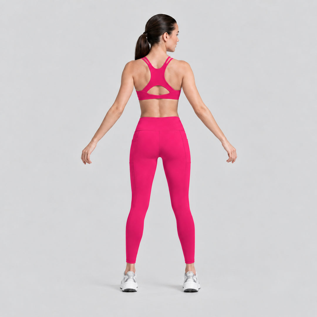 Conjunto deportivo fucsia con top tipo racer y legging tiro alto