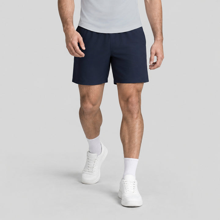 Short 2 en 1 hombre azul marino con dobladillo recto, interior gris asomando