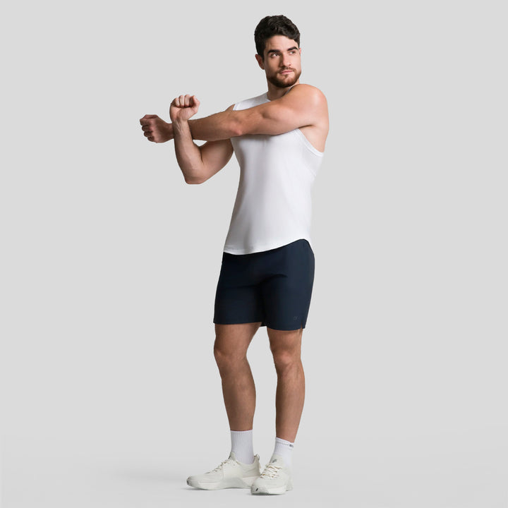 Short deportivo de hombre ATLEKX en azul oscuro, con logo pequeño y dobladillo recto