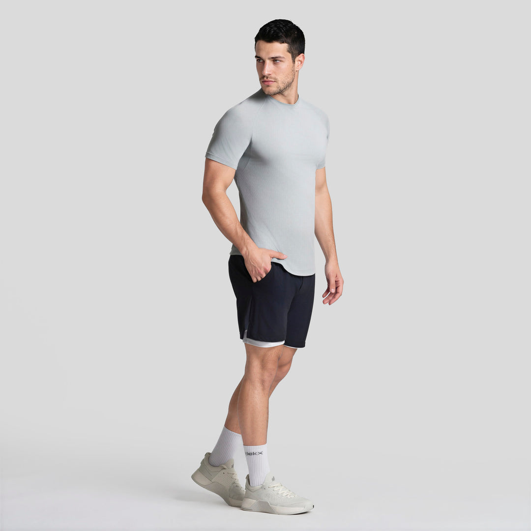 Short deportivo 2 en 1 para hombre negro, dobladillo con contraste y malla interior