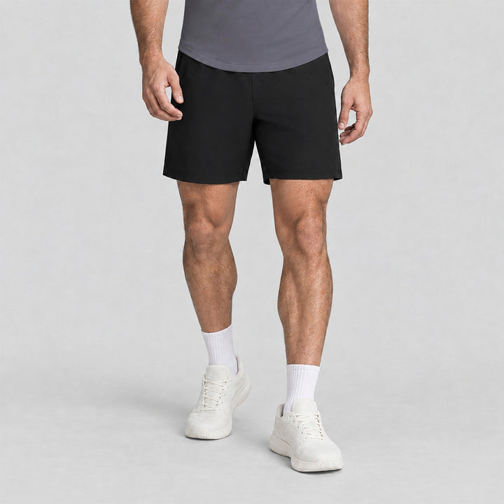 Pantalón corto 2 en 1 de hombre negro con costuras laterales y dobladillo liso