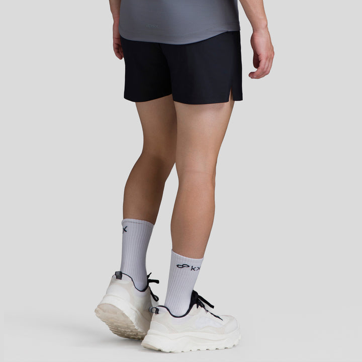 Short deportivo para hombre negro, corte medio, cintura elástica y logo lateral