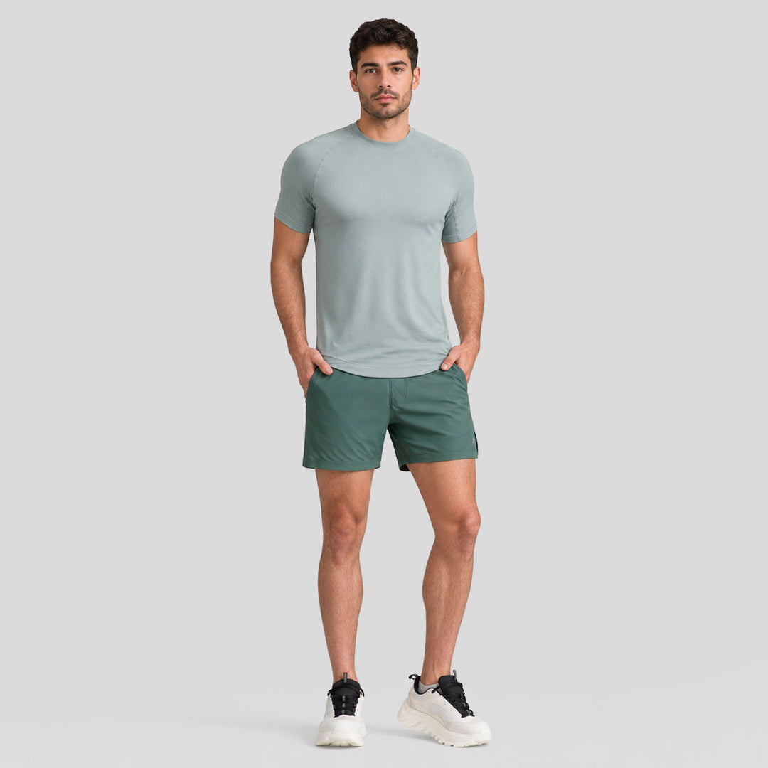 Short deportivo 2 en 1 para hombre verde, tiro medio y forro interior.