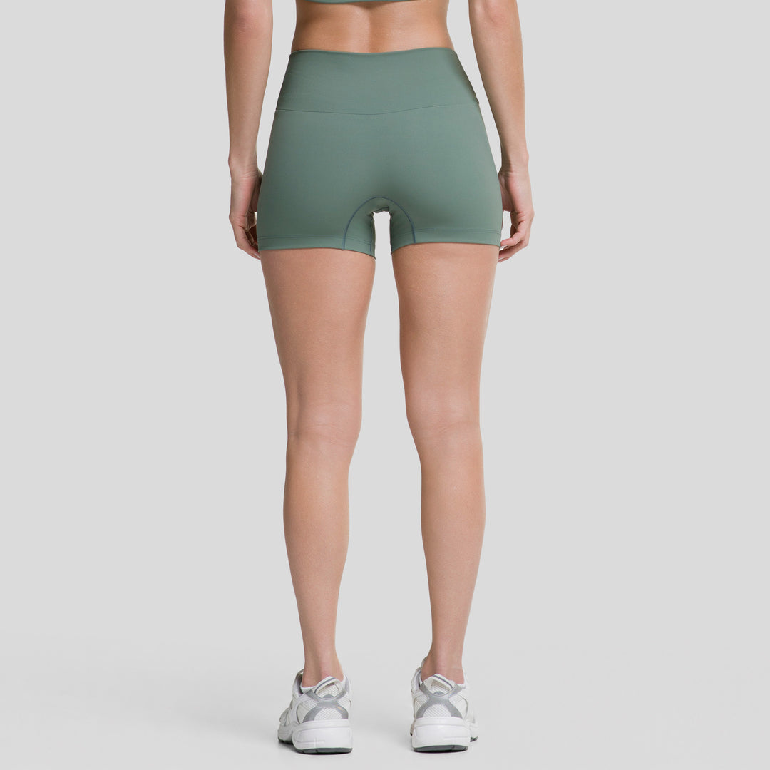 Short biker plano 3.5" para mujer ATLEKX verde, tiro alto, vista trasera