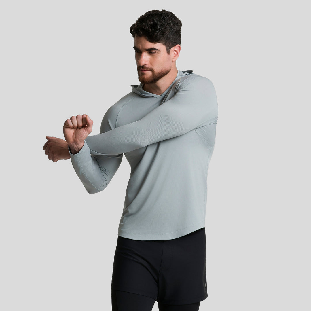 Playera deportiva de manga larga con capucha, azul claro, hombre, vista lateral