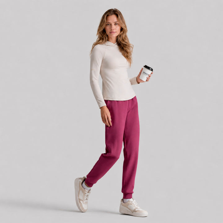 Sudadera deportiva ligera beige con capucha y puños elásticos
