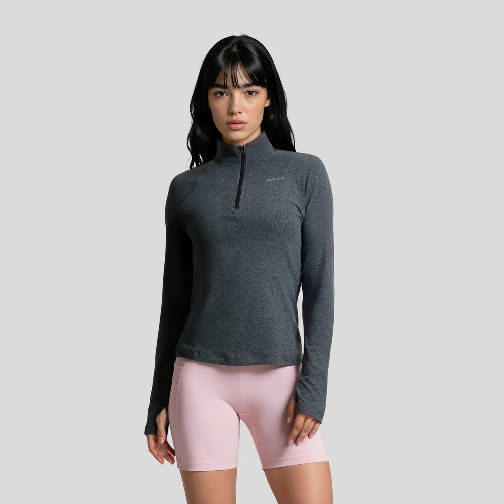 Sudadera deportiva gris con media cremallera, cuello alto y manga larga