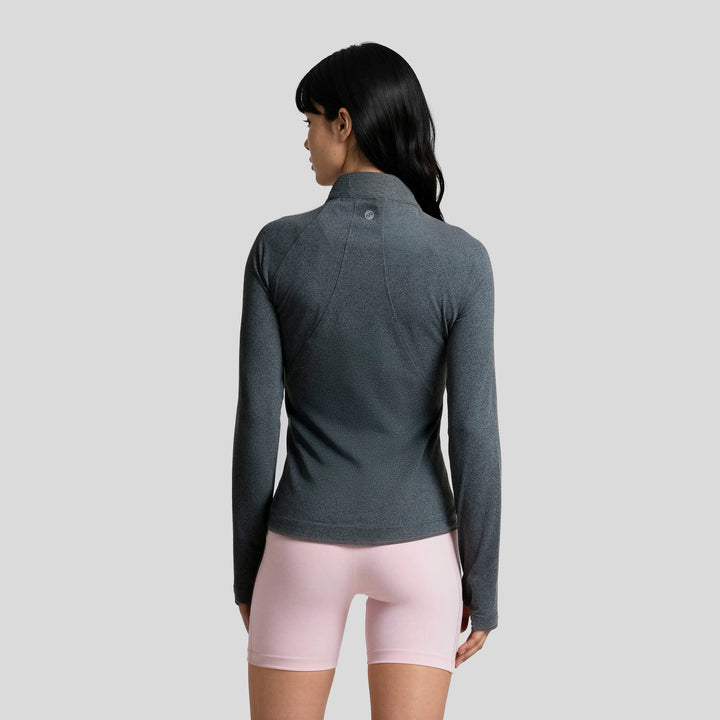 Sudadera deportiva gris con cremallera 1/2, vista trasera y manga larga