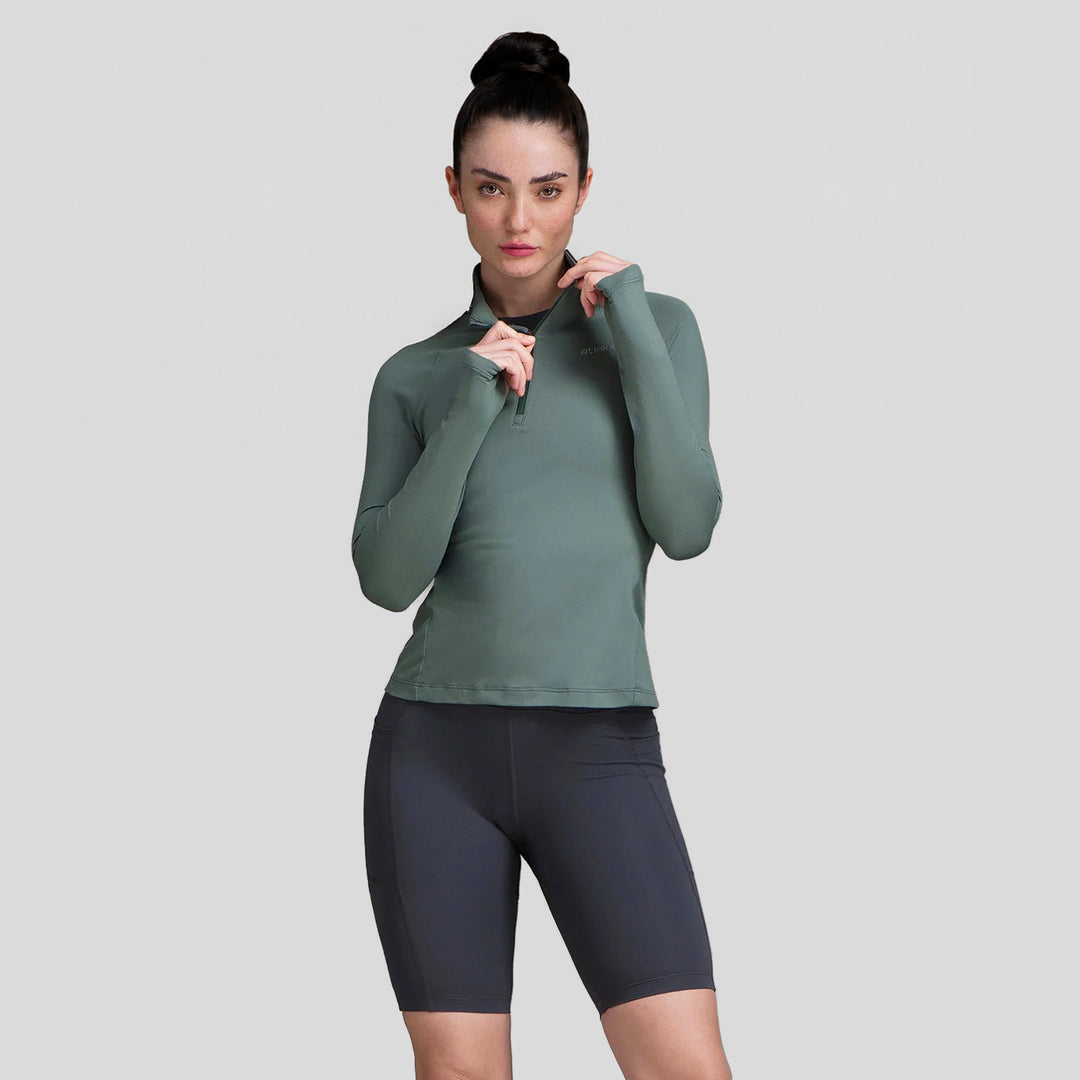 Sudadera deportiva mujer verde con media cremallera y diseño entallado, vista frontal