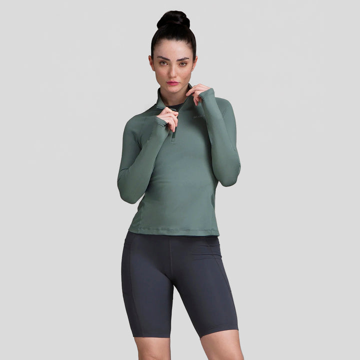 Sudadera deportiva mujer verde con media cremallera y diseño entallado, vista frontal