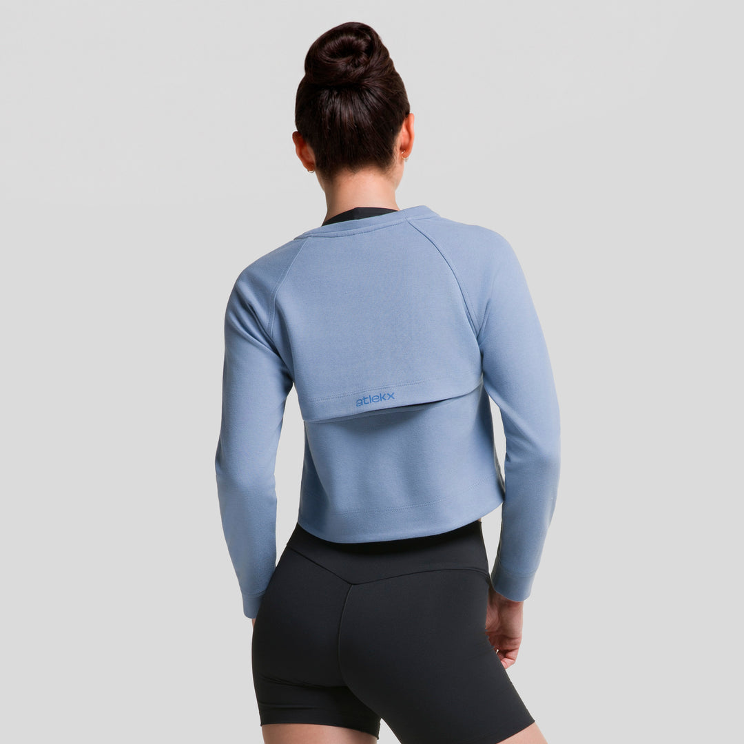Sudadera corta azul Zeal de mujer con espalda lisa y logo pequeño en el centro