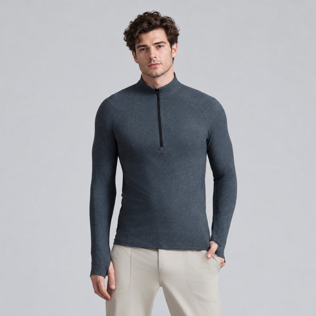 Sudadera deportiva gris para hombre con cremallera media frontal y ajuste cómodo.