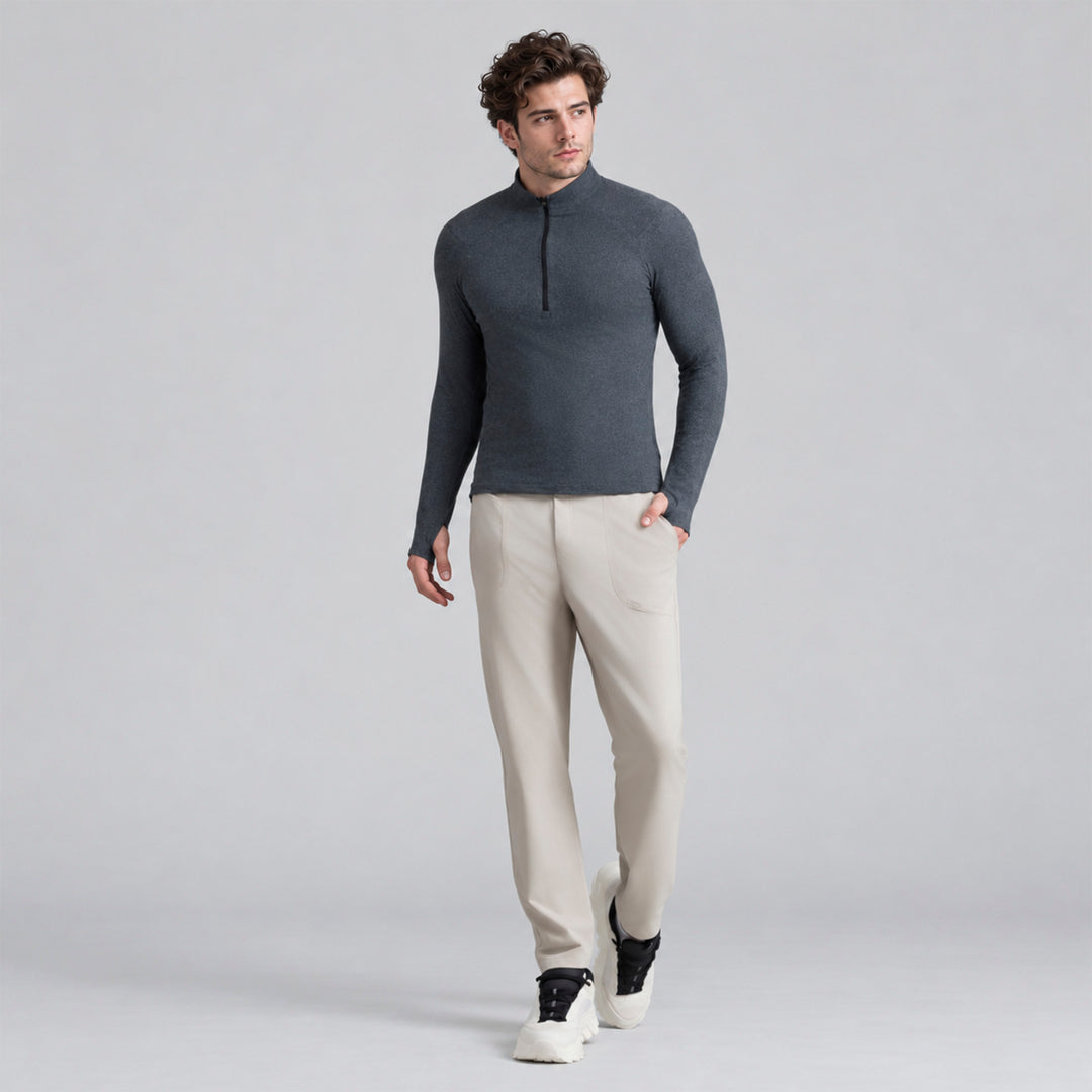Sudadera deportiva gris para hombre con cremallera media y cuello alto, manga larga.