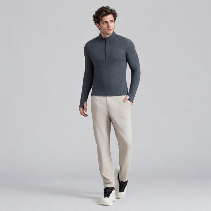 Sudadera deportiva gris para hombre con cremallera media y cuello alto, manga larga.