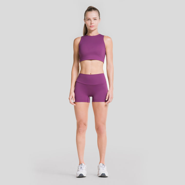Top deportivo sin mangas de mujer morado lila, vista de cuerpo completo
