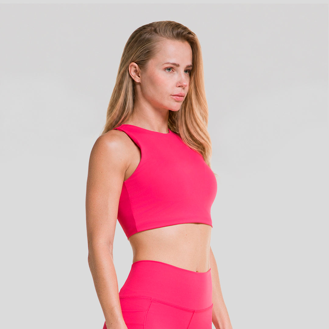 Top deportivo sin mangas de mujer fucsia, frontal liso y escote redondo