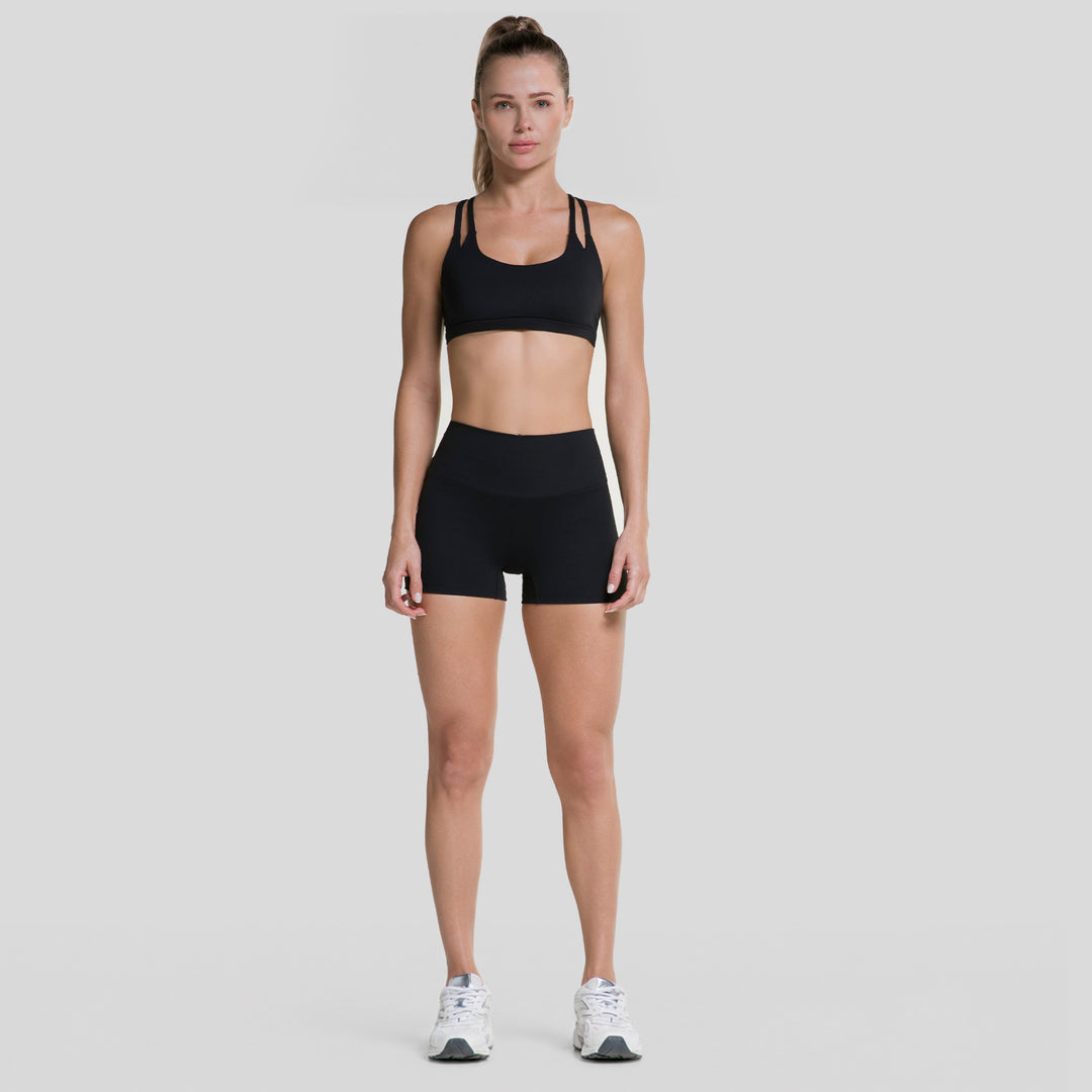 Top deportivo de tirantes para mujer negro con diseño strappy