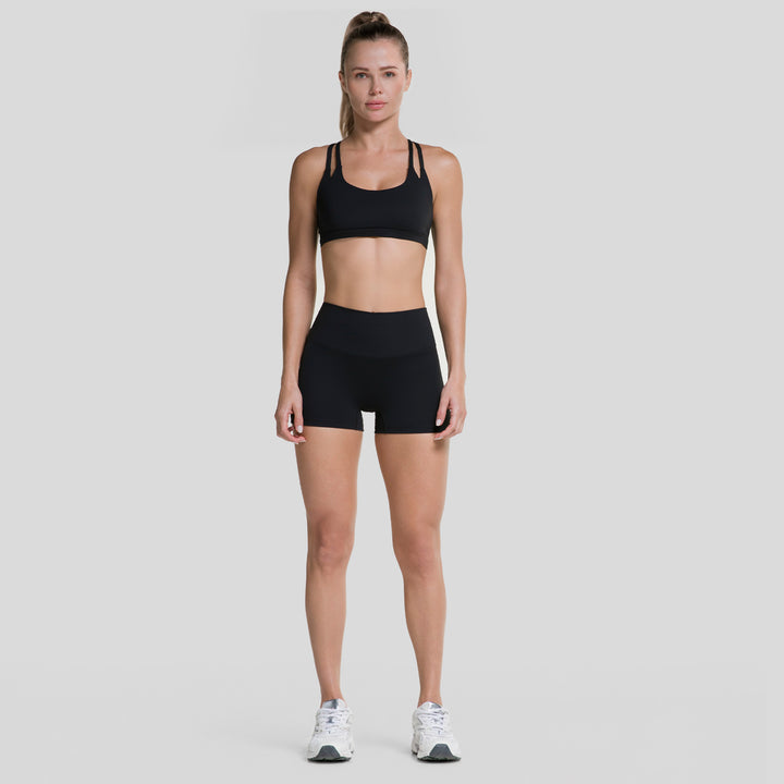 Top deportivo de tirantes para mujer negro con diseño strappy