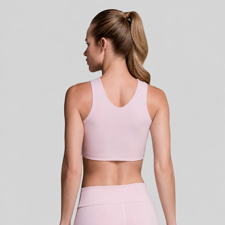 Top deportivo ATLEKX rosa claro sin mangas, espalda con escote en U