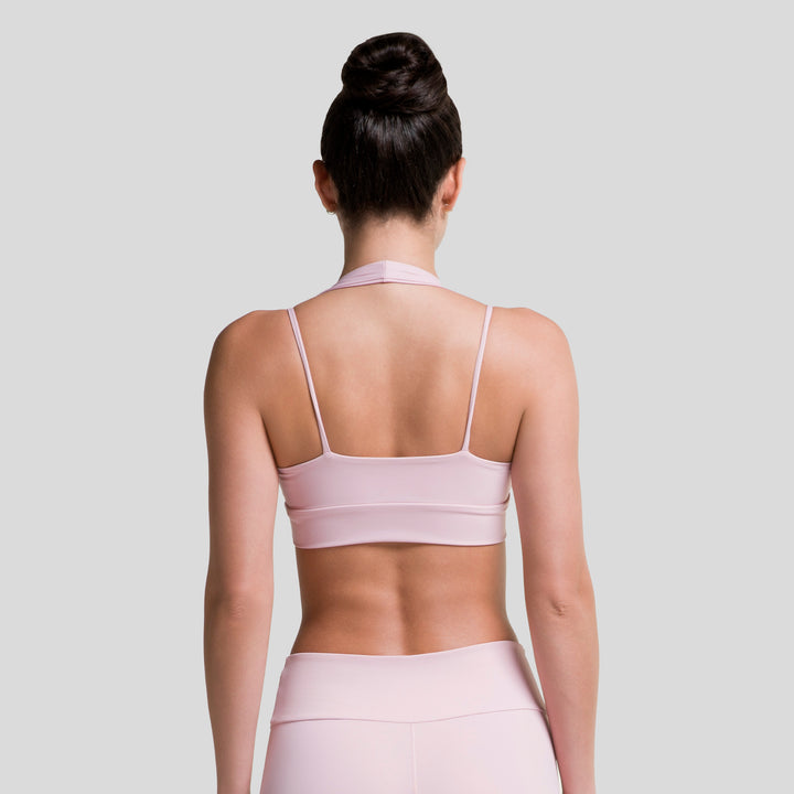 Top deportivo ATLEKX rosa claro con espalda descubierta y tirantes rectos