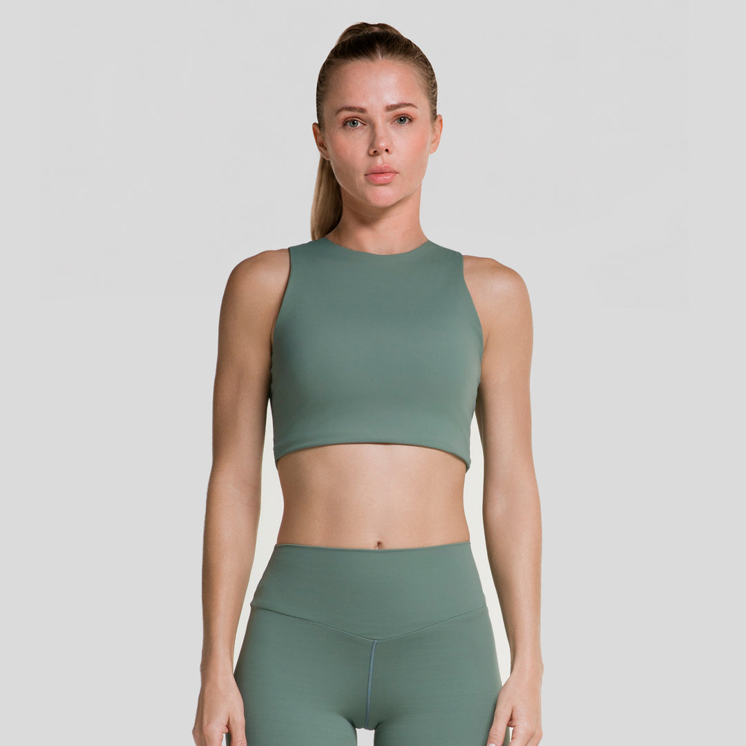 Top deportivo sin mangas mujer color verde oscuro, corte ajustado